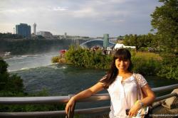 Joann leans next to rail at the American side of the Niagara Falls.jpg