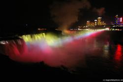Niagara Horseshoe Falls illuminated at night by light show.jpg