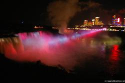 Changing colors of Niagara Falls at night light show now in red on Horseshoe Falls.jpg