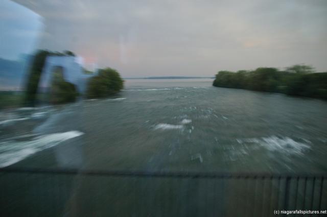Rushing waters near Niagara Falls as seen from tour bus.jpg