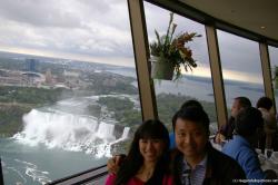 David and Joann at the Skylon Tower Revolving Dining Room Restaurant with the American Niagara Falls in the background.jpg